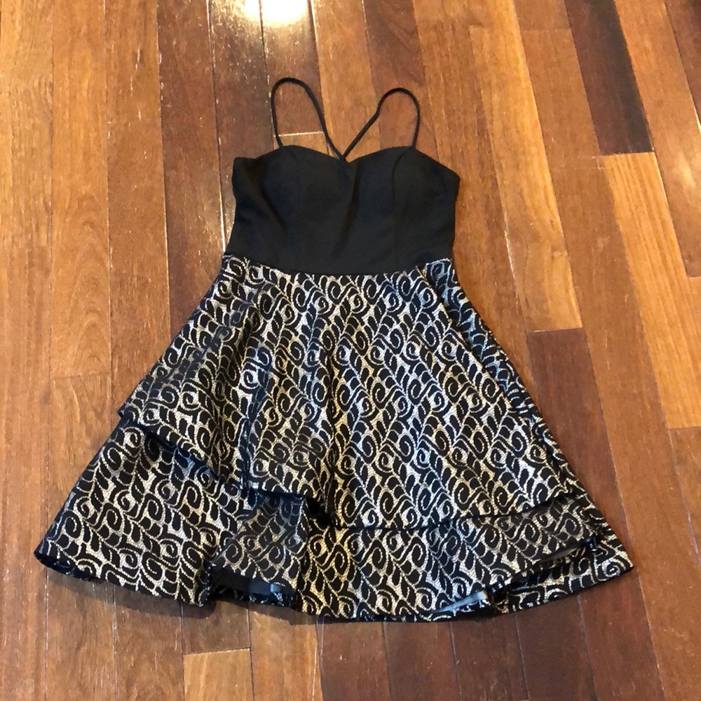 Elegant Black and Gold Mini Dress